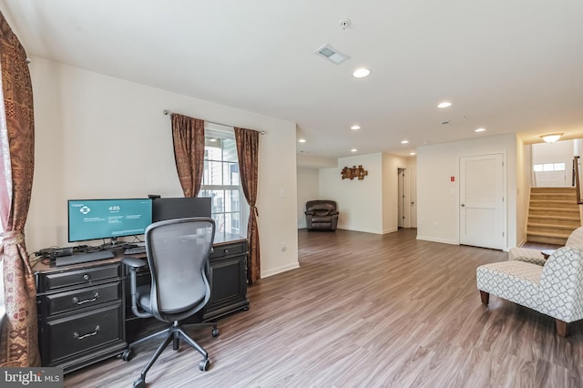 home office featuring hardwood / wood-style flooring