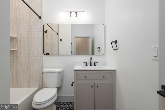 full bathroom with tiled shower / bath, vanity, toilet, and tile patterned flooring