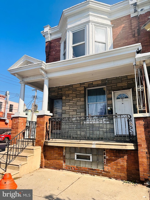 multi unit property featuring covered porch