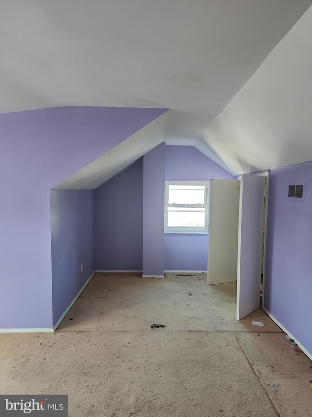 bonus room featuring vaulted ceiling