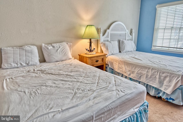 bedroom featuring carpet flooring