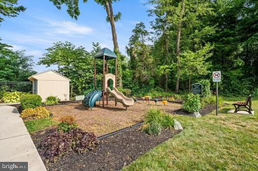 view of playground featuring a yard