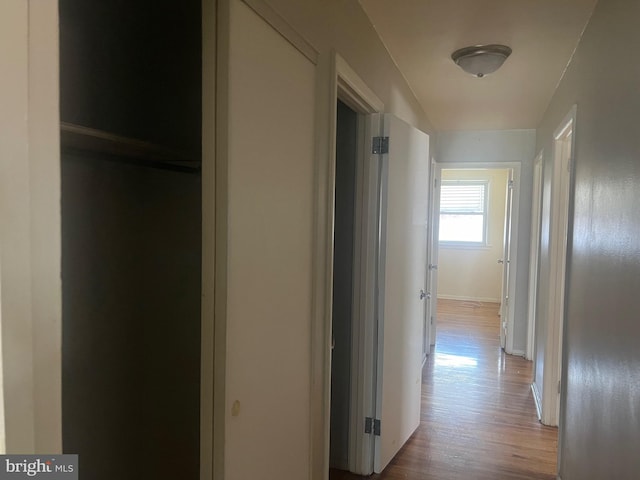 hallway featuring light wood-type flooring