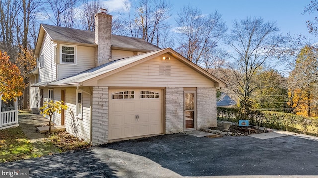 exterior space with a garage