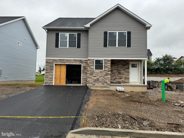 view of front of home with a garage