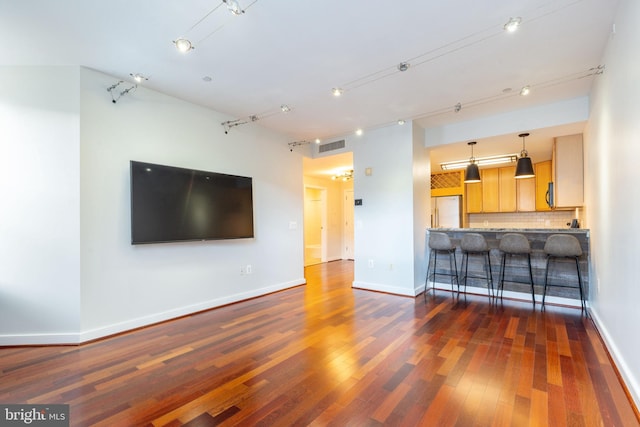 living room with dark hardwood / wood-style floors