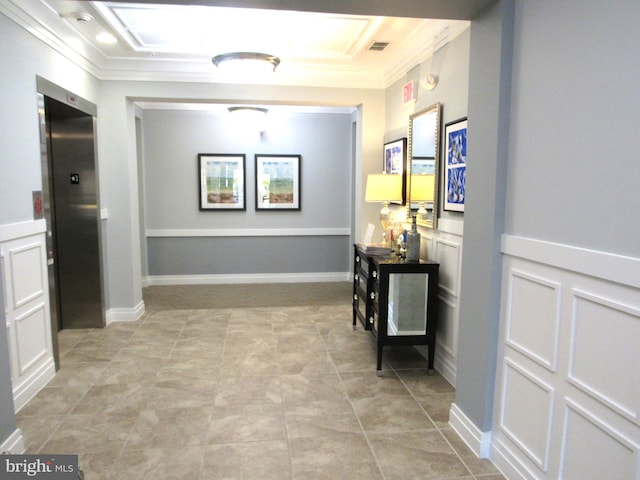 corridor with elevator and crown molding