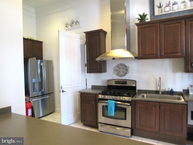 kitchen with appliances with stainless steel finishes, sink, ornamental molding, and wall chimney range hood