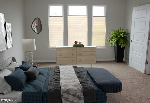 bedroom featuring light colored carpet and multiple windows