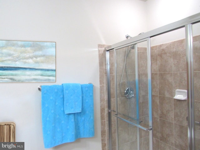 bathroom with an enclosed shower