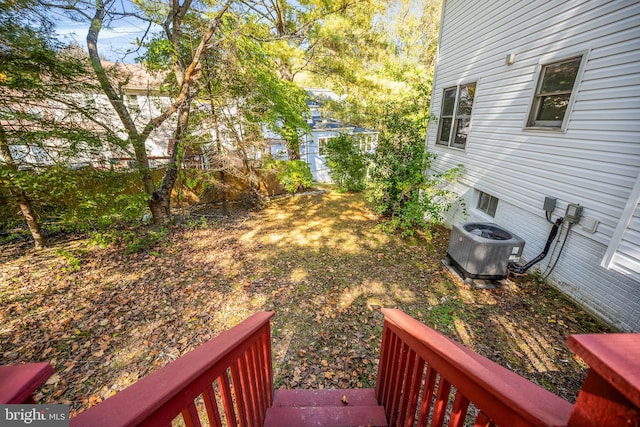 view of yard featuring central AC