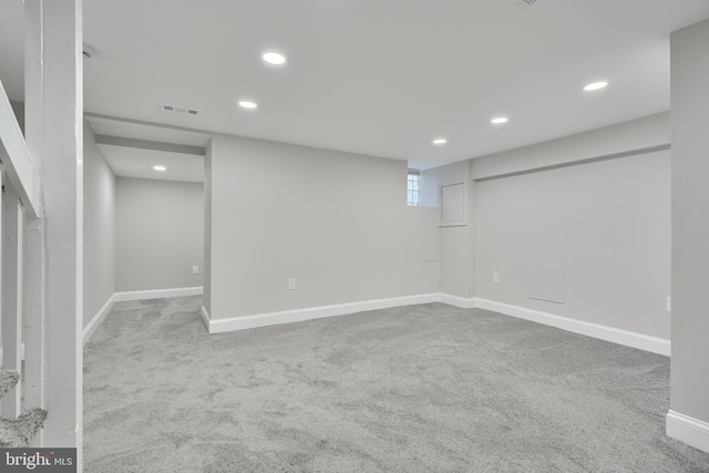 basement featuring carpet