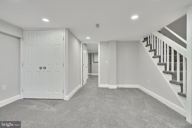 basement with carpet flooring