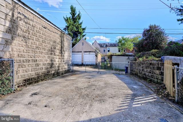 exterior space with an outdoor structure and a garage