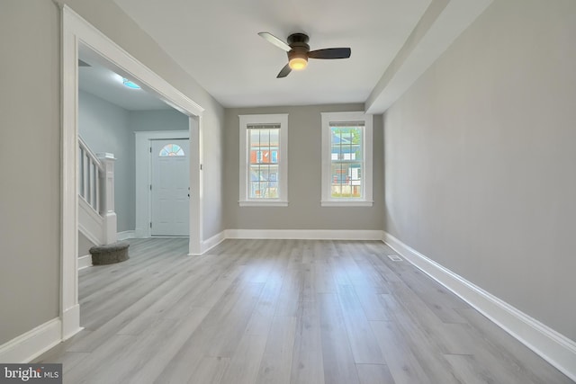 foyer entrance featuring ceiling fan and light hardwood / wood-style flooring