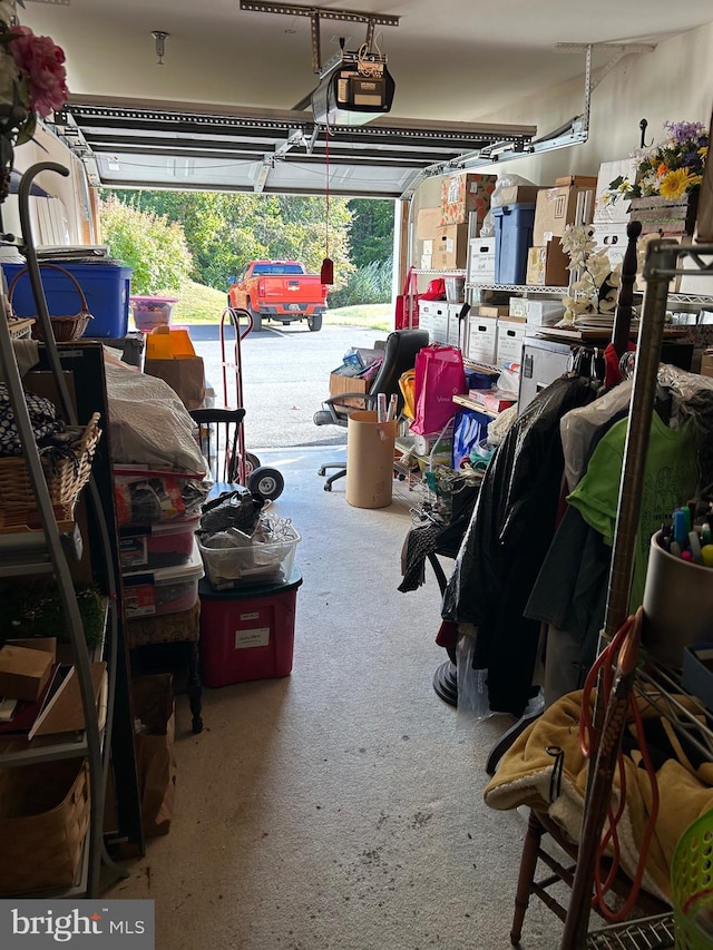 garage featuring a garage door opener