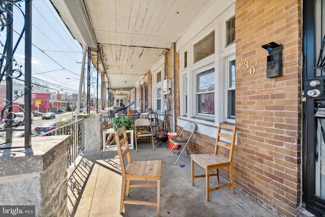 view of patio featuring a porch