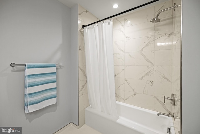 bathroom featuring shower / bath combo with shower curtain