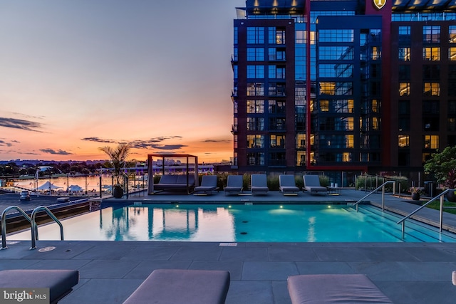 community pool featuring a patio area