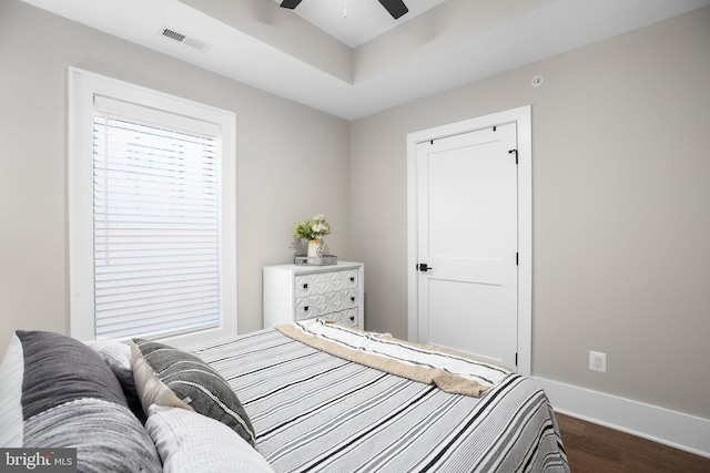 bedroom featuring dark wood-type flooring and ceiling fan