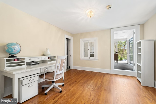 home office featuring light wood-type flooring