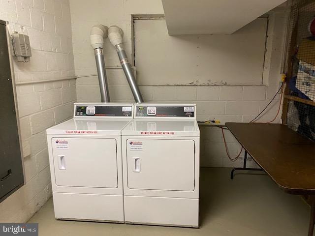 washroom featuring independent washer and dryer