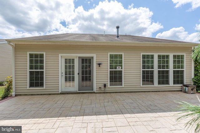 back of house featuring a patio area