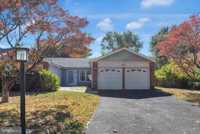 single story home featuring a garage