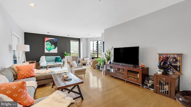 living room with light hardwood / wood-style floors