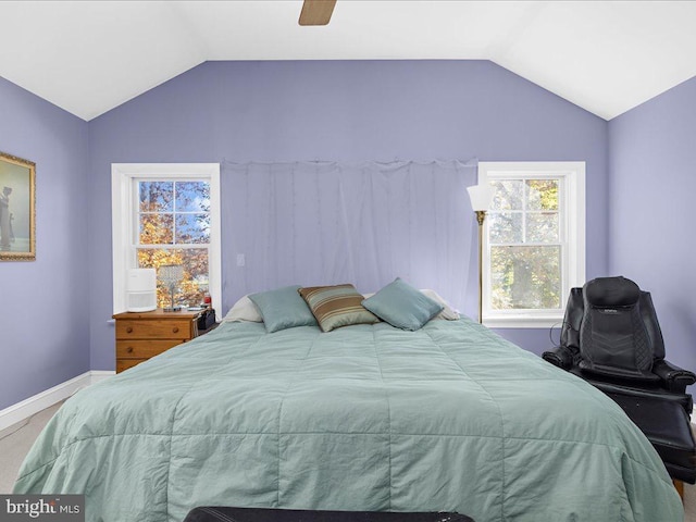 bedroom with lofted ceiling and ceiling fan