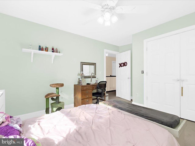 bedroom featuring ceiling fan and a closet