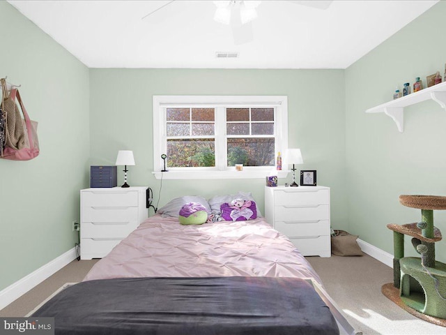 carpeted bedroom with ceiling fan