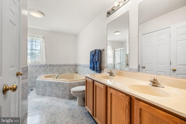 full bathroom with vanity, independent shower and bath, toilet, and tile patterned flooring