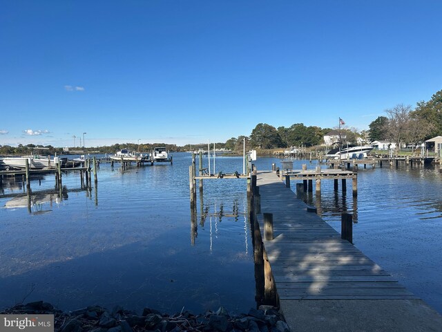 view of dock with a water view