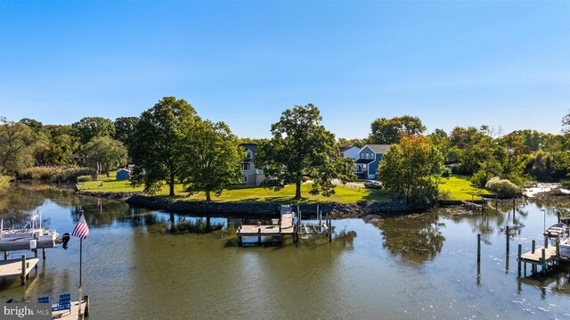 dock area featuring a water view