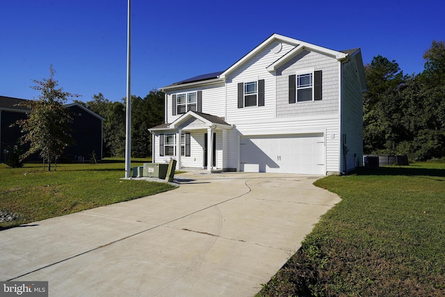 view of property with central AC, a garage, and a front lawn