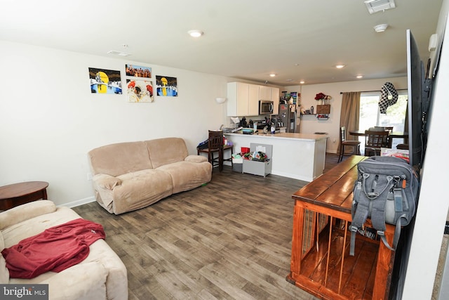 living room featuring dark hardwood / wood-style floors