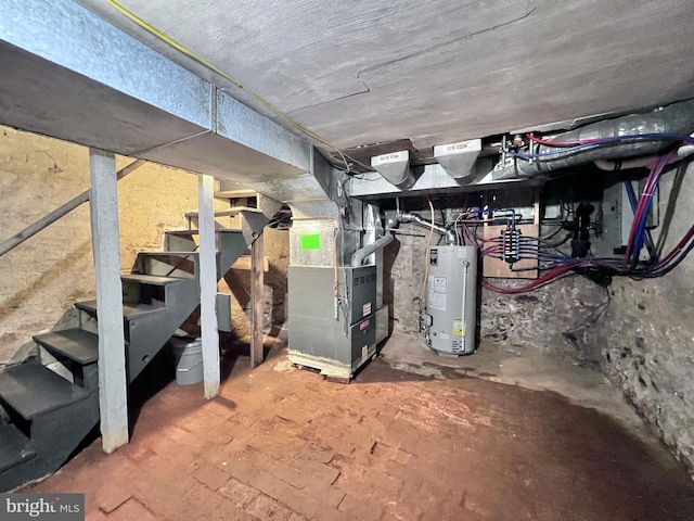 unfinished below grade area with heating unit, water heater, and stairs