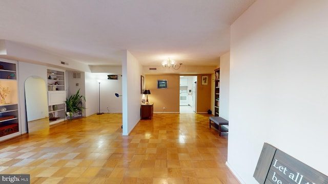 foyer featuring a notable chandelier