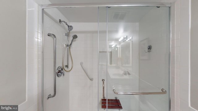 bathroom with an enclosed shower