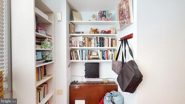 office area featuring a textured ceiling