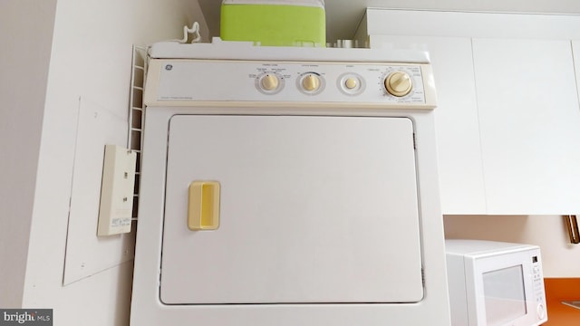 laundry area with washer and dryer