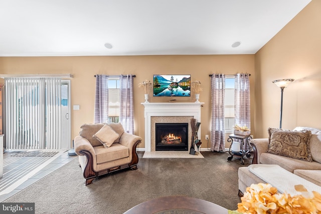 carpeted living room featuring a healthy amount of sunlight