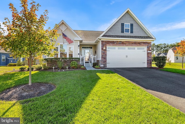 craftsman inspired home featuring a front lawn and a garage