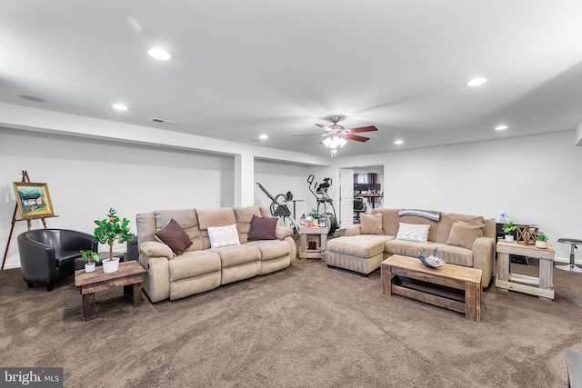 living room with carpet and ceiling fan