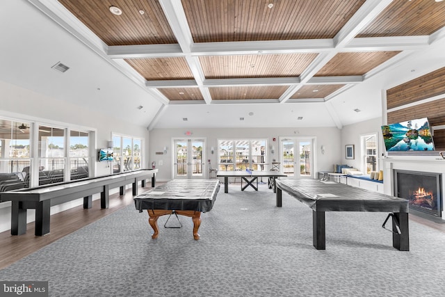 rec room with french doors, pool table, wood ceiling, beam ceiling, and wood-type flooring