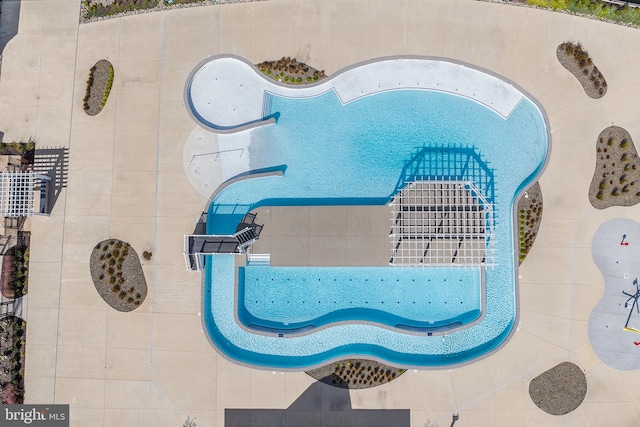 view of swimming pool featuring a patio