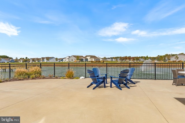 view of patio / terrace featuring a water view