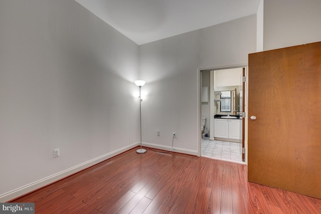 spare room featuring light hardwood / wood-style floors