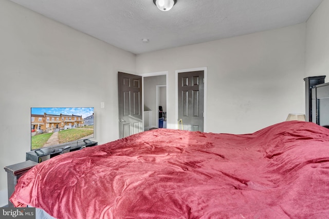 bedroom featuring a textured ceiling